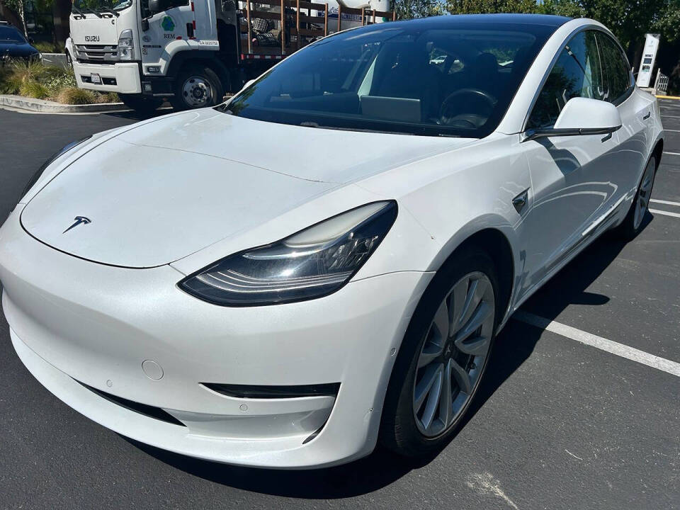 tesla model 3 2018 5YJ3E1EB8JF067463 image tesla model 3 2018 5YJ3E1EB8JF067463 image